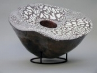 Double Walled Vessel with slips, glazes and lusters.